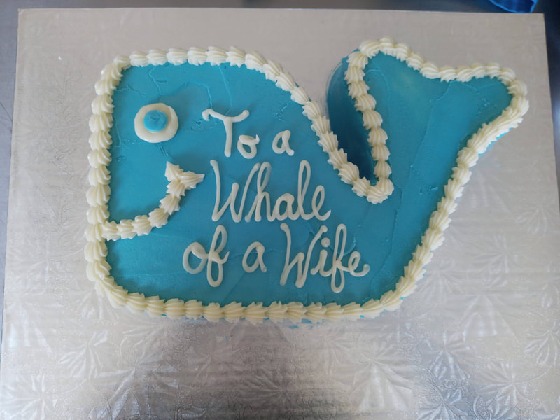 Blue cartoon whale cake