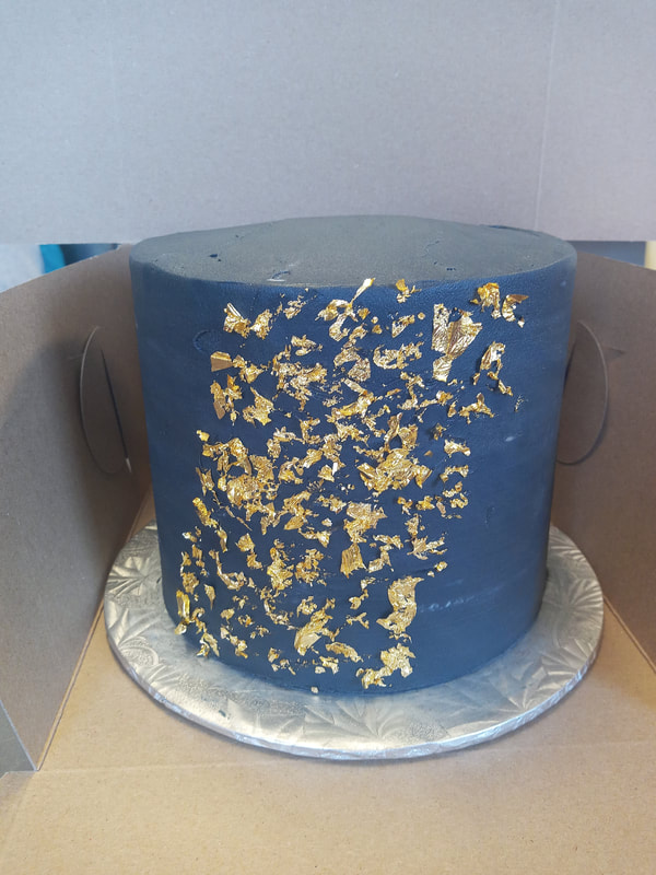 Blue cake with gold foil