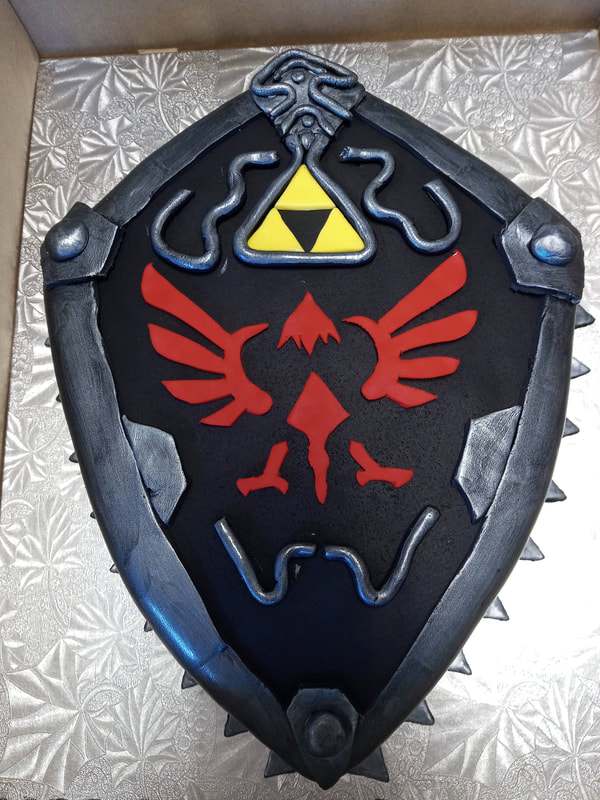 Legend of Zelda Hylian shield cake