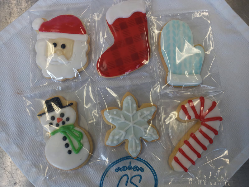 Santa, Stocking, mitten, candy cane, snowflake and snowman cookies