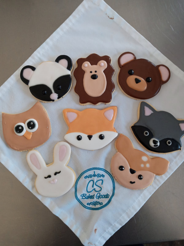 Panda, loin, grizzly bear, owl, fox, racoon, bunny and deer cookies