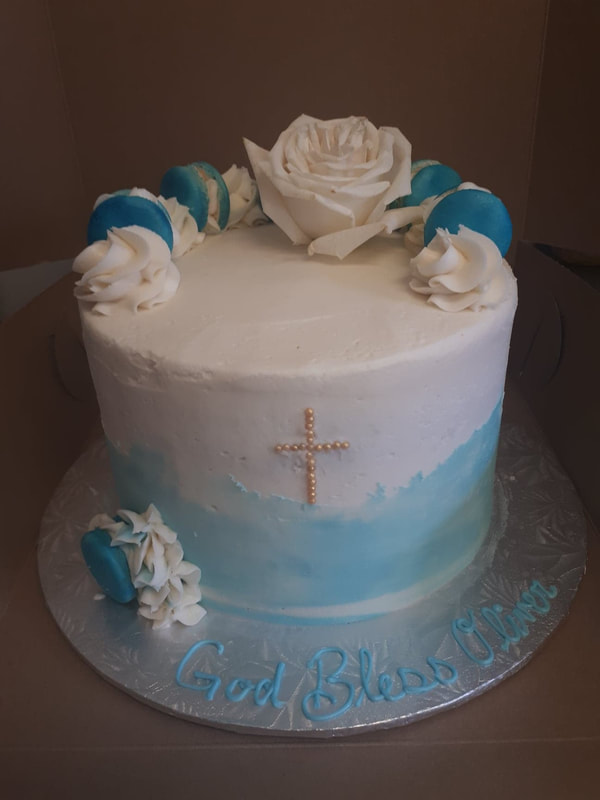 Blue and white communion cake