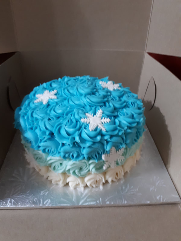 Blue and white winter cake